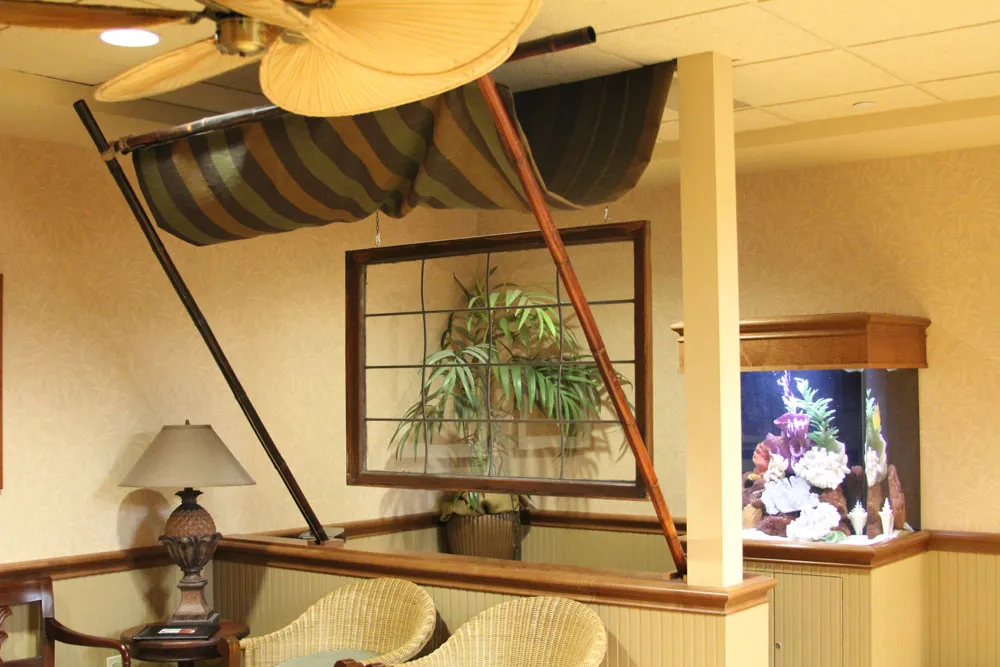 Photo of Chong Aesthetic & Implant Dentistry relaxing waiting room with tropical beach theme